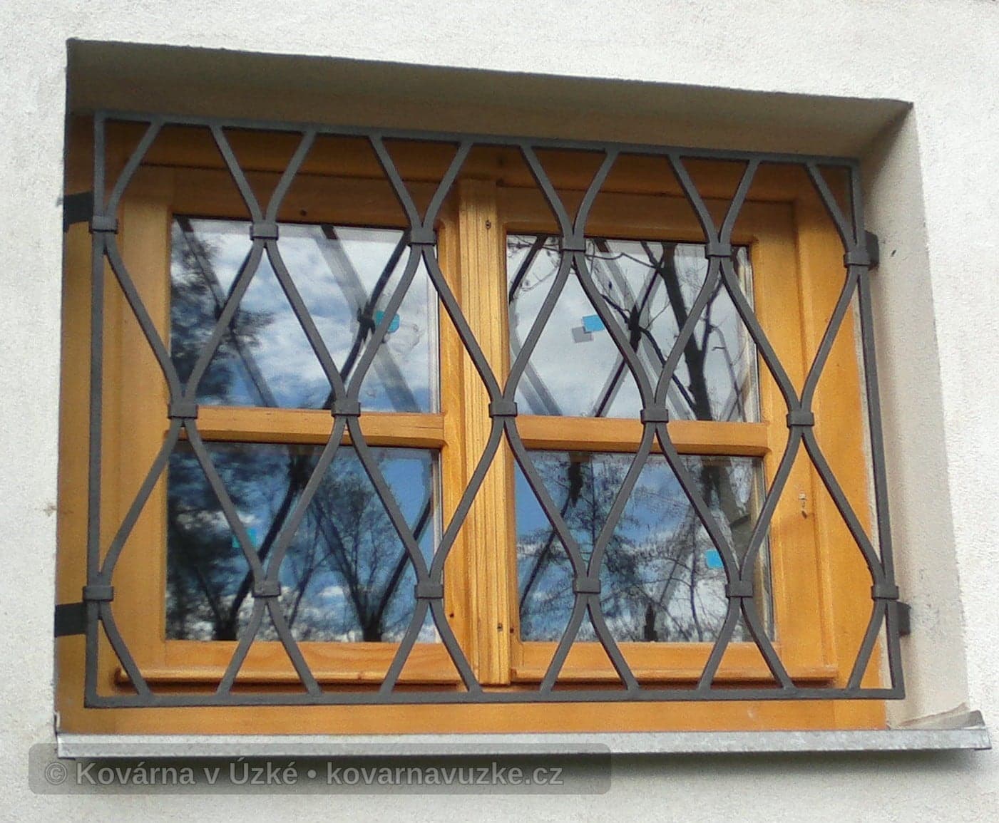 Kovaná mříž
